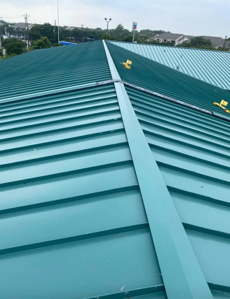 Green commercial metal roof ridge and valley for Metal Roof Repair in Chatham