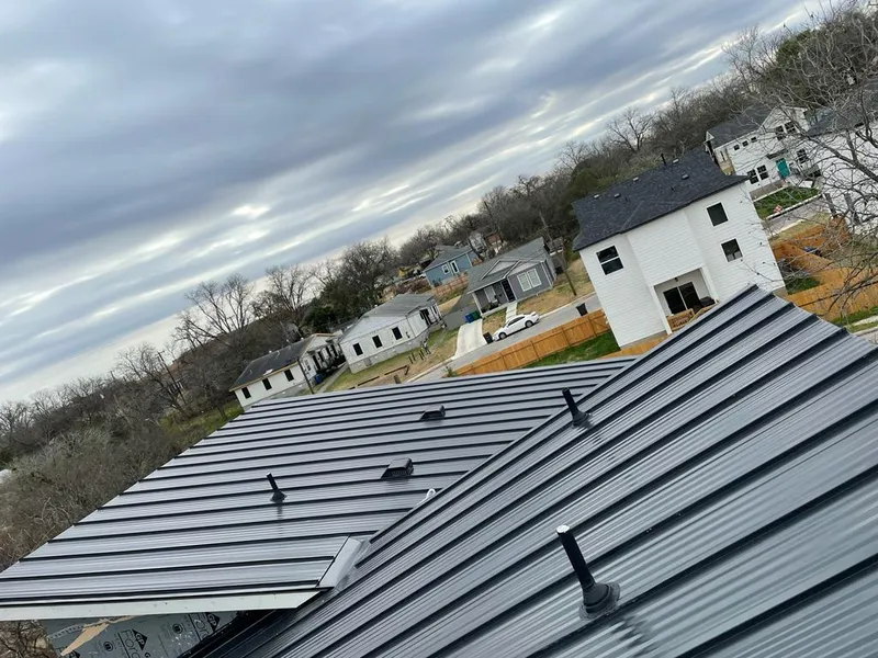Standing seam metal roof panels with vents for Skylight Repair in Chatham